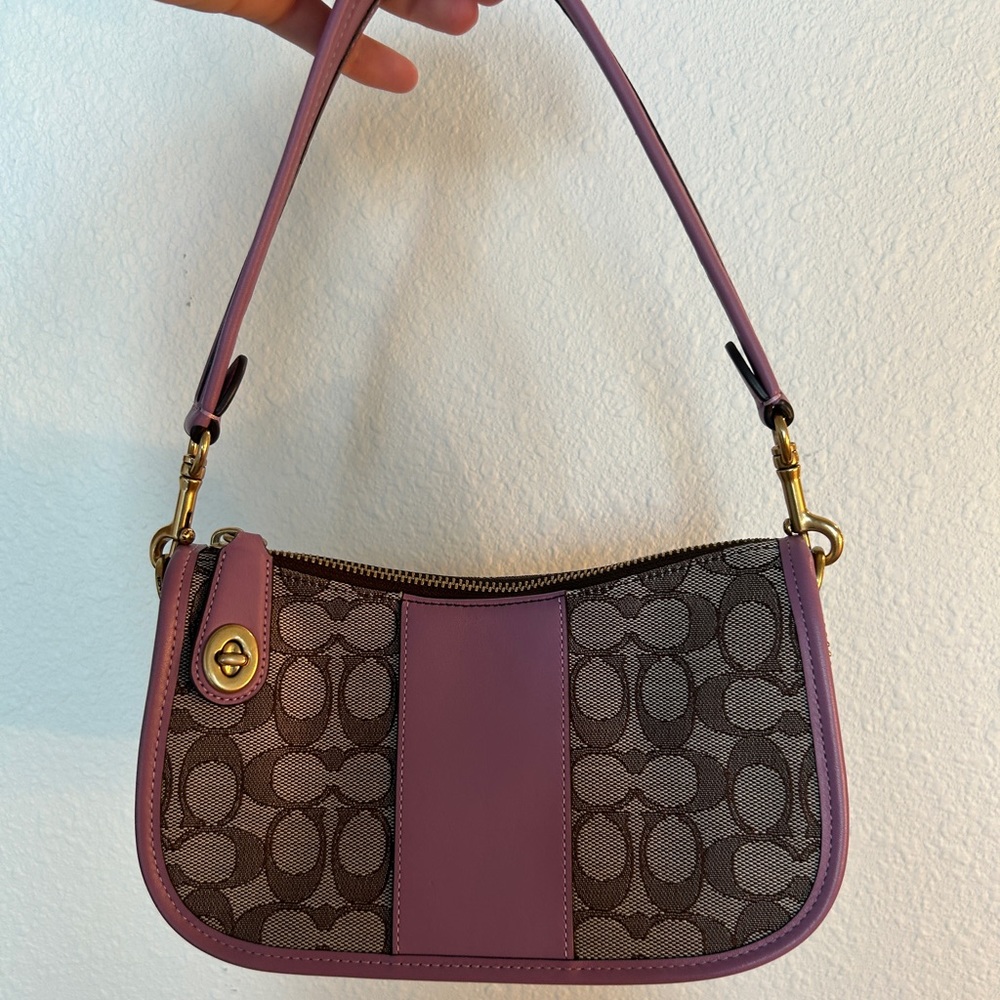 Purple coach monogram swinger jacquard bag